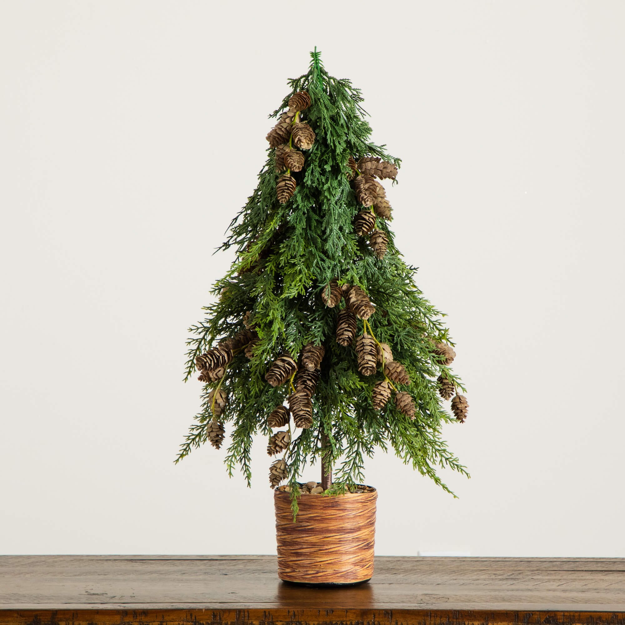 2-ft Down Swept Cedar Christmas Tree with Pinecones in Decorative Planter 7 2-ft Down Swept Cedar Christmas Tree with Pinecones in Decorative Planter